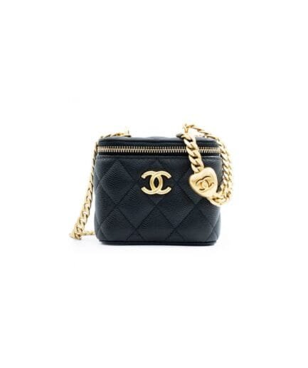 Chanel small gold ball makeup bag